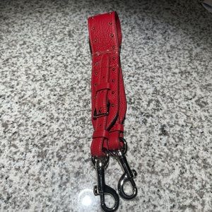 Red leather shoulder bag strap